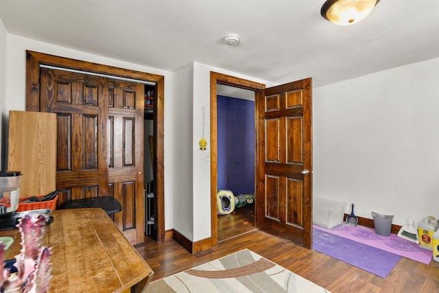 bedroom featuring dark hardwood / wood-style flooring