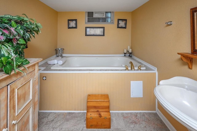 bathroom featuring a bathtub