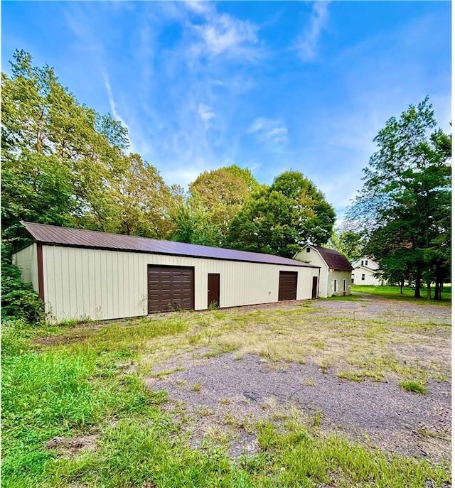 view of outbuilding featuring a garage