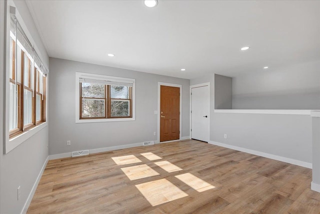 empty room featuring light hardwood / wood-style floors