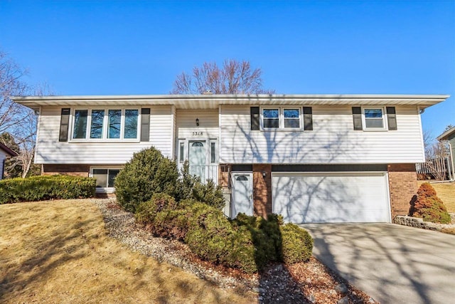 split foyer home featuring a garage