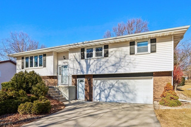 bi-level home featuring a garage