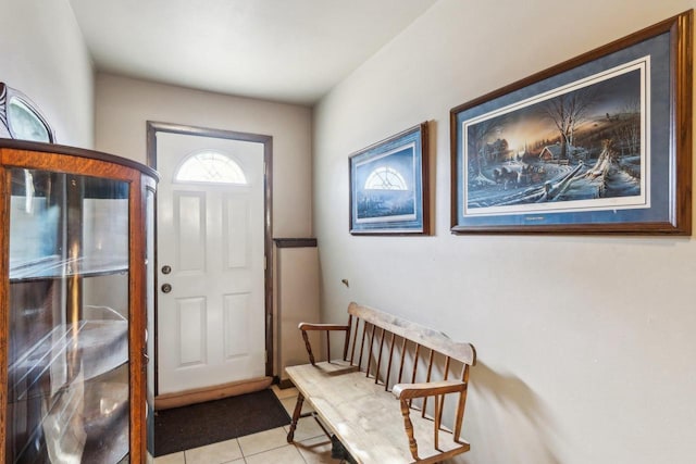 entrance foyer featuring light tile patterned floors