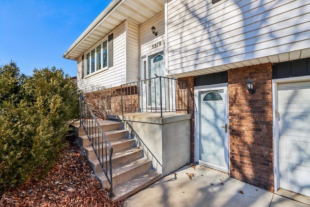 property entrance with a garage