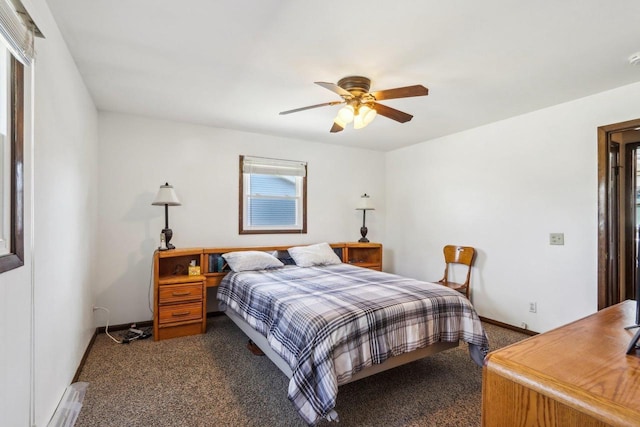 bedroom with ceiling fan and carpet