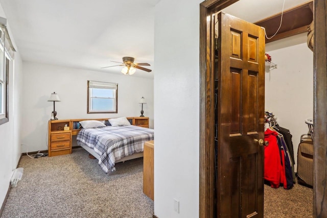 carpeted bedroom featuring ceiling fan