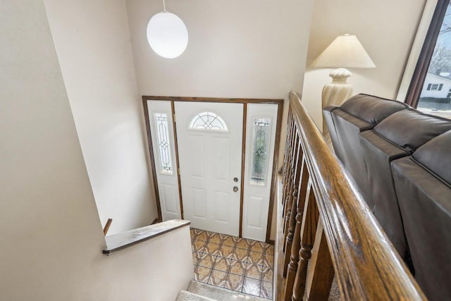 foyer with a high ceiling