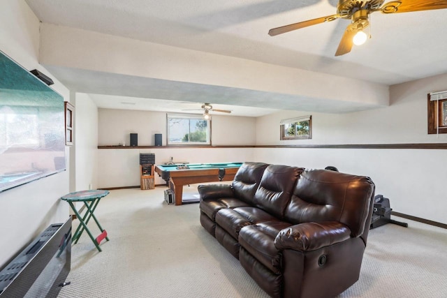 living room featuring pool table, light colored carpet, and ceiling fan