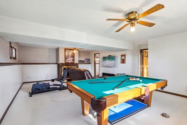 rec room with pool table, light colored carpet, and ceiling fan