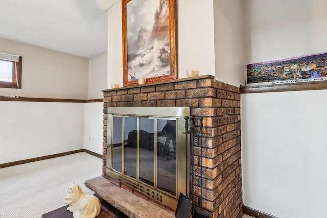 details with a fireplace and carpet flooring