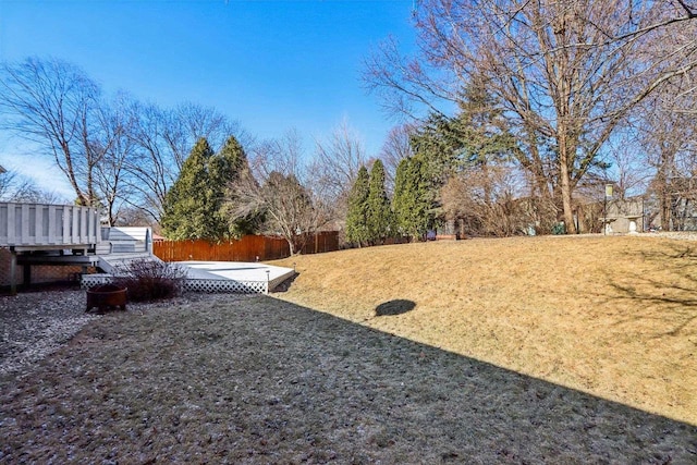 view of yard with a deck