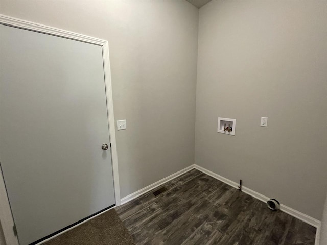 laundry room with dark wood-type flooring and washer hookup