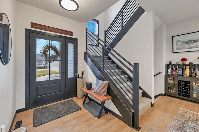 foyer entrance featuring light hardwood / wood-style floors