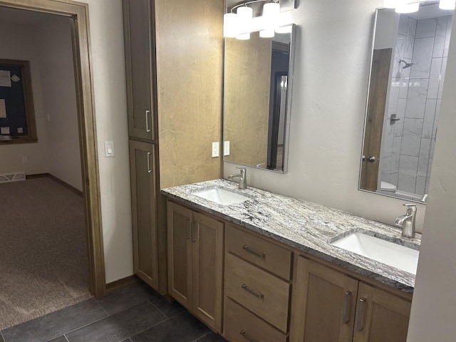 bathroom featuring vanity and tile patterned floors