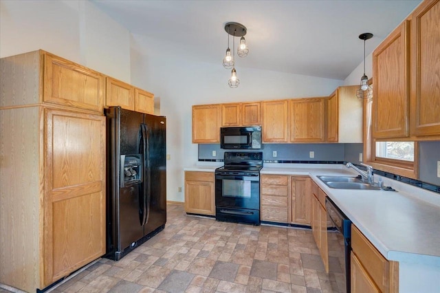 kitchen with lofted ceiling, decorative light fixtures, sink, and black appliances