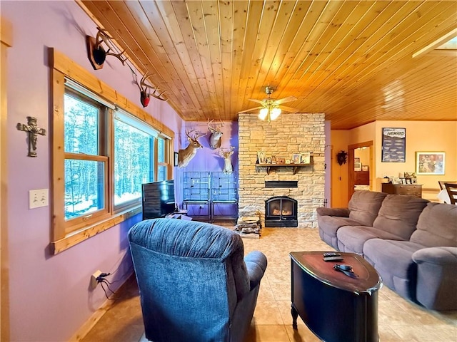 living room featuring ceiling fan, light tile patterned floors, wooden ceiling, and a fireplace