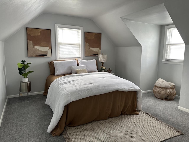 carpeted bedroom featuring vaulted ceiling