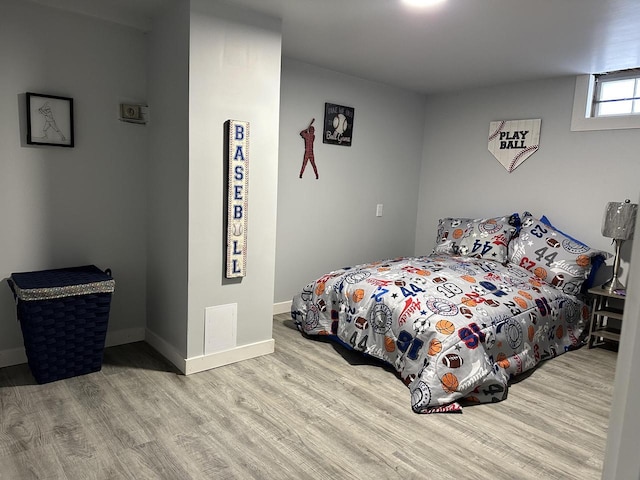 bedroom featuring light hardwood / wood-style flooring