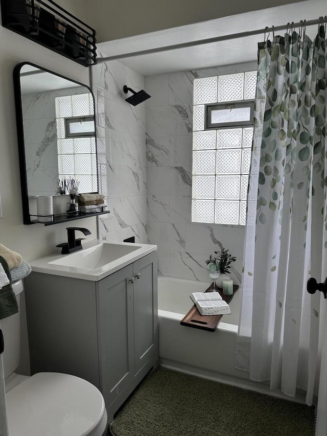 full bathroom featuring vanity, toilet, and shower / bath combo