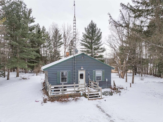 view of front of home with a wooden deck