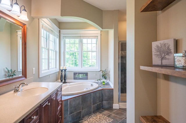 bathroom with vanity, separate shower and tub, and tile patterned floors