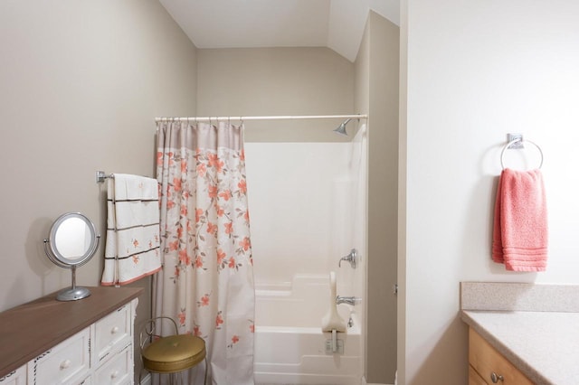 bathroom with vanity and shower / tub combo with curtain