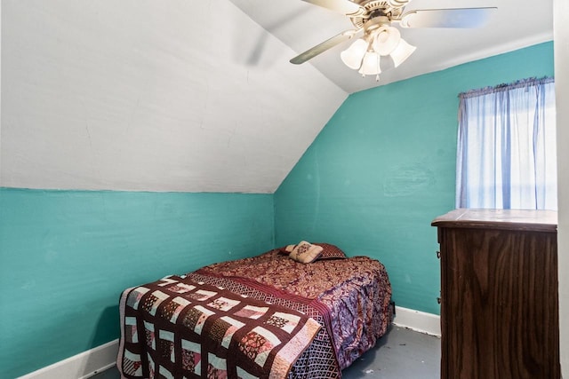 bedroom with ceiling fan and vaulted ceiling