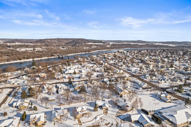 birds eye view of property with a mountain view