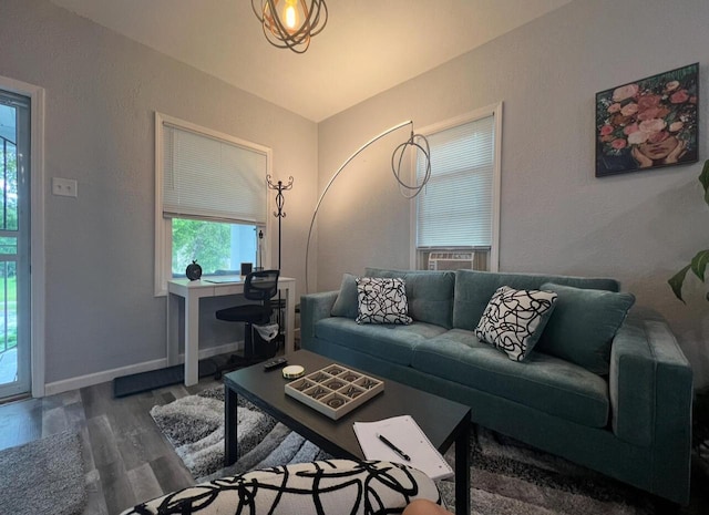 living room with dark hardwood / wood-style floors