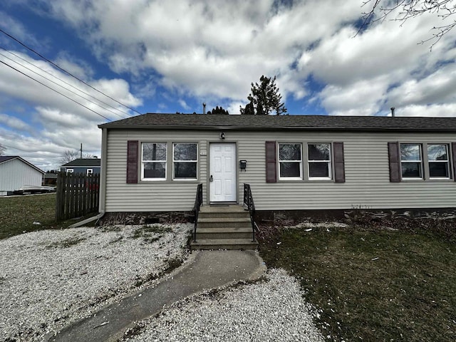 view of front of home with a front lawn