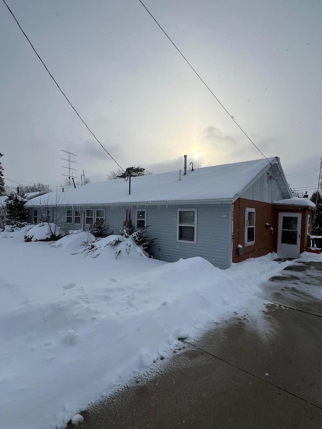 view of snow covered property