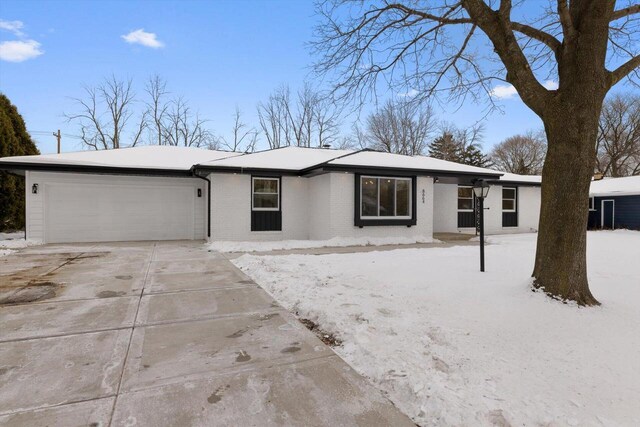 ranch-style home with a garage