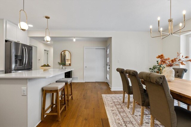 dining area with light wood-type flooring
