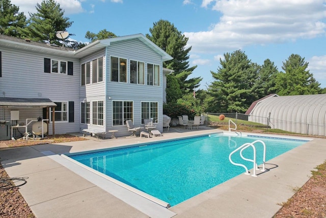 view of pool featuring a patio area