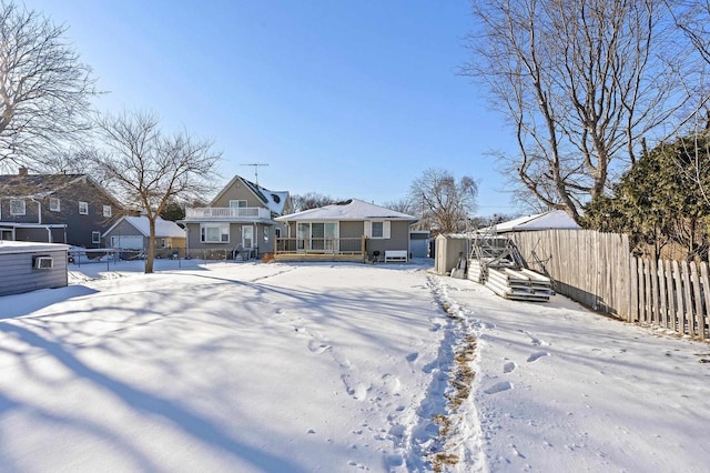 90 Lake St, Oshkosh, WI 54901 - yard covered in snow with fence