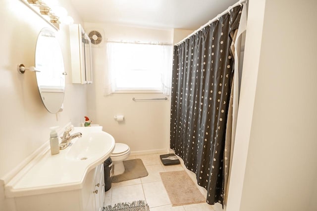 6050 Cth Y, Hazelhurst, WI 53531 - bathroom with a shower with curtain, tile patterned floors, toilet, and a healthy amount of sunlight