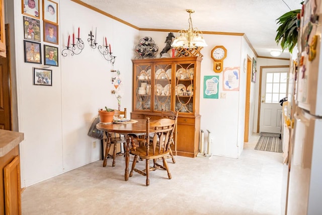 6050 Cth Y, Hazelhurst, WI 53531 - dining room with ornamental molding and an inviting chandelier