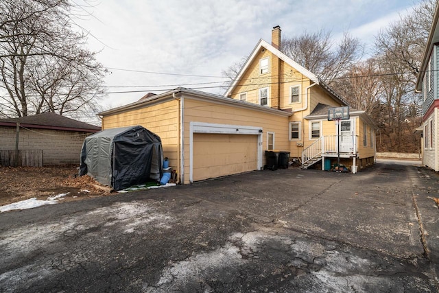 exterior space featuring a garage