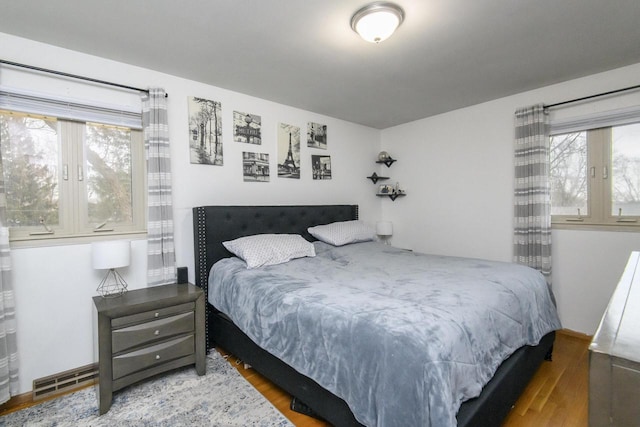 bedroom featuring wood finished floors