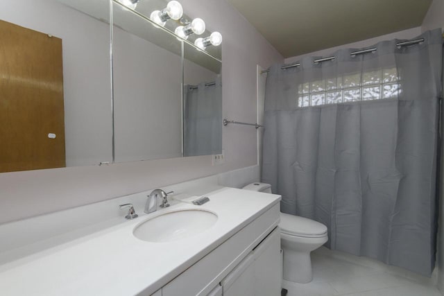 full bathroom with toilet, tile patterned floors, a shower with shower curtain, and vanity