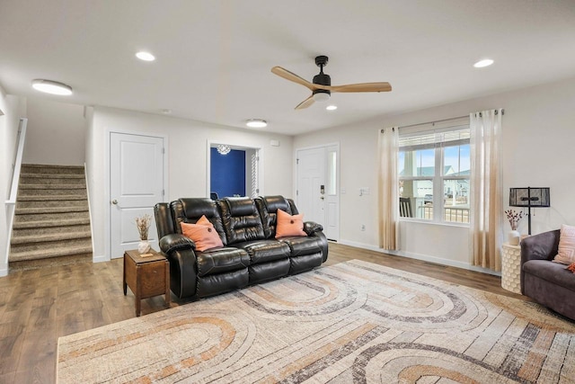 living room with recessed lighting, stairway, ceiling fan, wood finished floors, and baseboards