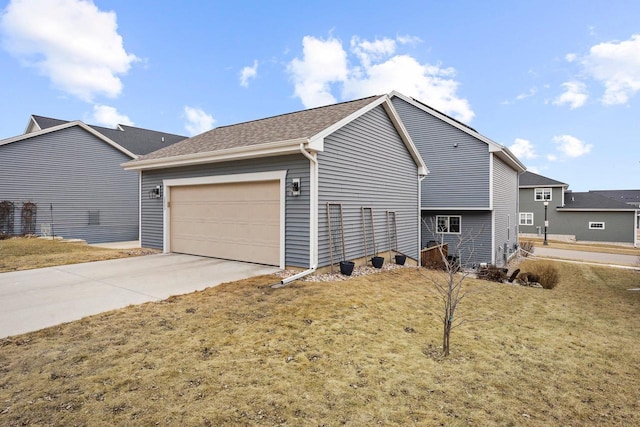 view of home's exterior with driveway and an attached garage