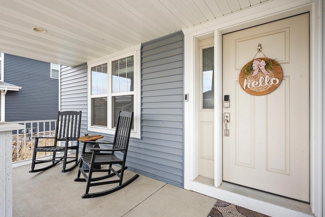 entrance to property with covered porch