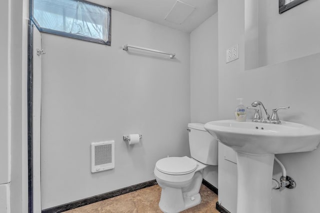 bathroom featuring toilet