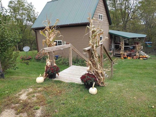 view of side of home featuring a yard