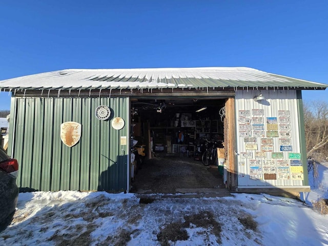 view of snow covered garage