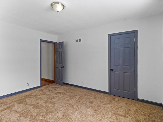 view of carpeted spare room