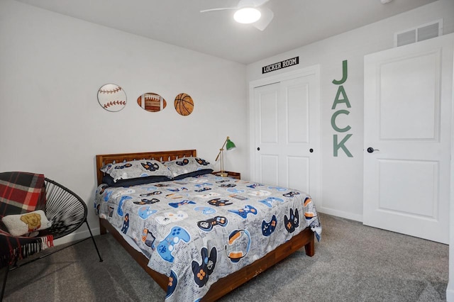 bedroom with carpet floors, a closet, visible vents, ceiling fan, and baseboards