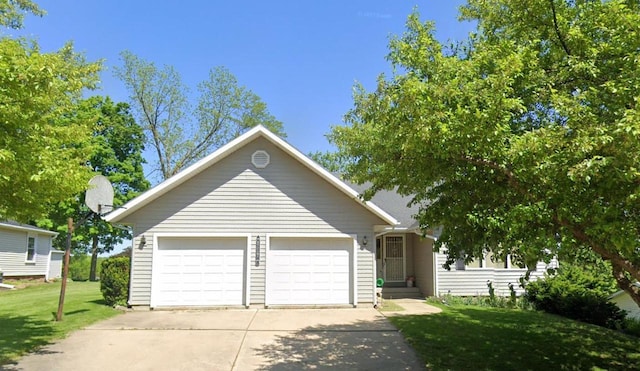 414 S Wisconsin St, Mineral Point, WI 53565 - ranch-style home with a garage, a front yard, and driveway