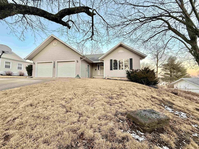 414 S Wisconsin St, Mineral Point, WI 53565 - ranch-style house with a garage and driveway